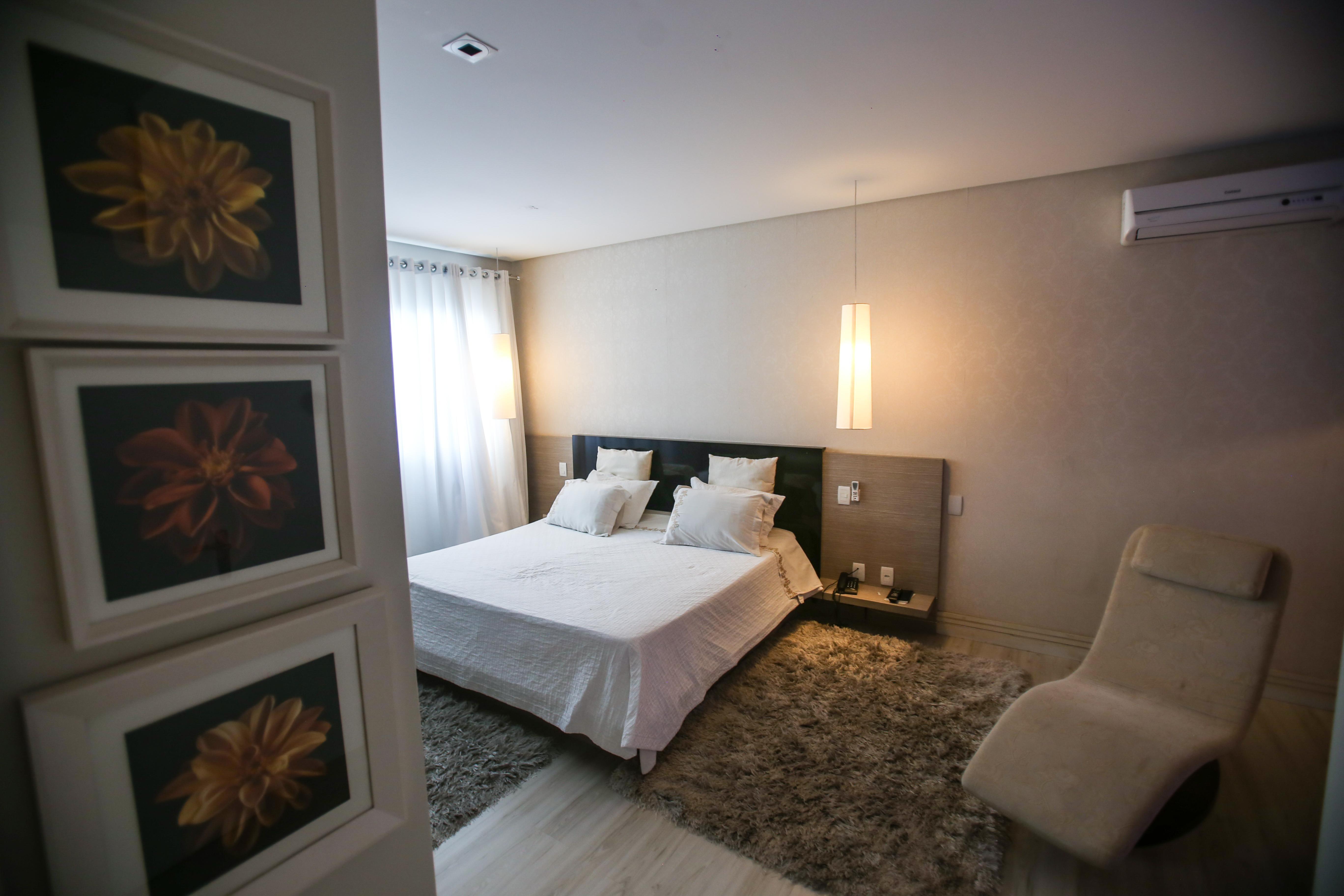 Gontijo Inn Hotel Itajubá Exteriér fotografie A bedroom in a house
