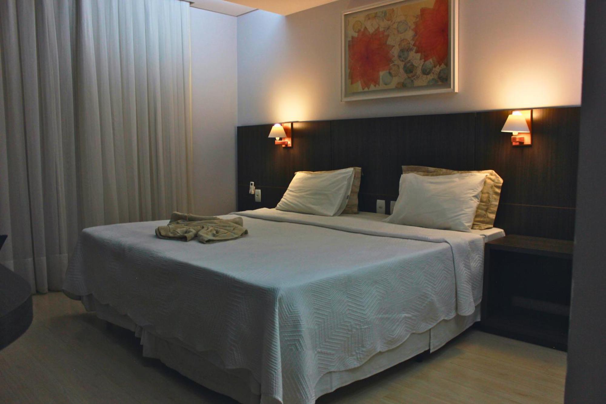 Gontijo Inn Hotel Itajubá Exteriér fotografie A bedroom